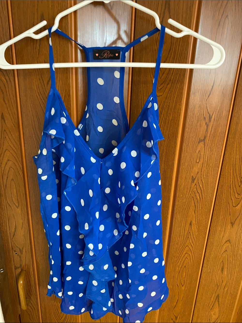 Vintage blue background with white polka dot top